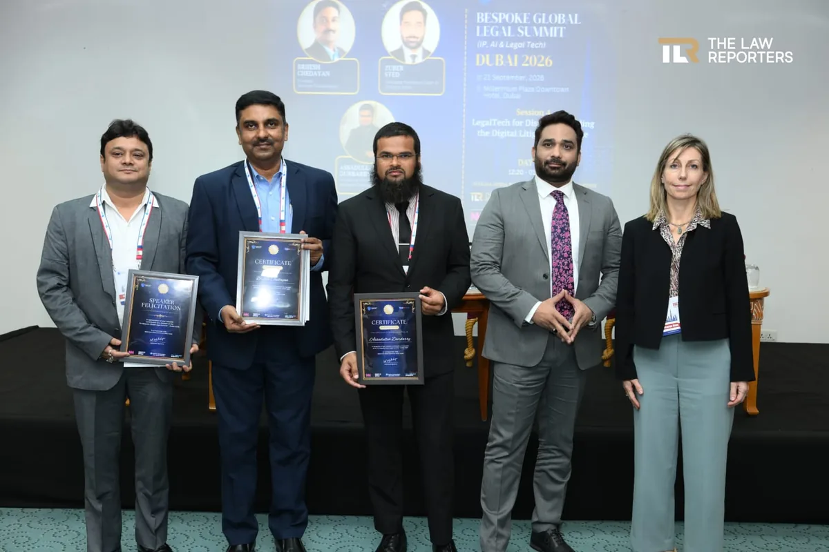LegalTech for Disputes moderator and panellists holding their certificates of appreciation on stage at BGLS Dubai